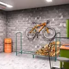 A garage or storage area with a bicycle mounted on the wall and a firewood rack filled with logs. Náhled obrázku produktu