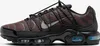 A studio shot of a single Nike Air Max Plus TN Utility sneaker. Voir les images du produit