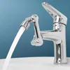 A close-up shot of a chrome faucet with water flowing from it. Podgląd zdjęcia produktu