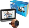 A product shot of a digital peephole doorbell and its packaging. Produktbild-Vorschau