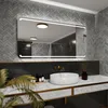A modern bathroom vanity with a large LED mirror, sink, and faucet. Produktbild-Vorschau