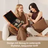 Two women sitting on a couch, one holding an open product case with hair dryer attachments. Produktbild-Vorschau