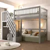 A child's bedroom with a gray bunk bed and a green trundle bed. Produktbild-Vorschau