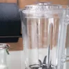 Close-up of a clear blender jar with measurement markings. Produktbild-Vorschau