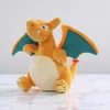 A plush toy of the Pokemon Charizard sitting on a marble-like surface. Produktbild-Vorschau