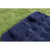 A navy blue inflatable mattress with two built-in pillows lying on grass. Anteprima dell’immagine prodotto