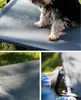 A collage of images showing a dog on an elevated pet bed, a close-up of the bed's mesh material, and a person's hand adjusting the bed's frame. Anteprima dell’immagine prodotto