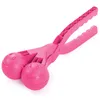 A pink snowball maker with smiley faces on the balls. Náhled obrázku produktu