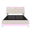 A beige upholstered bed frame with LED lighting. Produktbild-Vorschau
