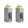 Two identical narrow bedside tables with a drawer and an open shelf, each topped with a tiered fruit bowl filled with fruit. Produktbild-Vorschau