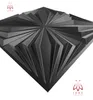 A 3D decorative wall panel with a geometric, faceted design, presented against a white background. Produktbild-Vorschau