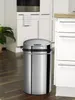 A stainless steel trash can with an IR sensor is shown in a kitchen setting. Produktbild-Vorschau