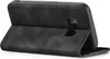 A black flip cover case for a Samsung Galaxy S8 phone is shown standing open, propped up on its cover. Produktbild-Vorschau