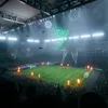 A soccer stadium at night with fireworks and drones. Produktbild-Vorschau