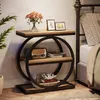 A bedside table with decorative items next to a bed. Anteprima dell’immagine prodotto