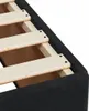 Close-up view of the wooden slats of a bed frame covered in black fabric. Produktbild-Vorschau