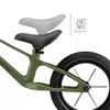 Close-up of a green balance bike seat with an adjustable height indicator and a graphic of a child with a ruler. Produktbild-Vorschau