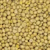 A close-up, overhead view of a pile of soybeans. Voir les images du produit