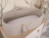 Lit pour bébé Boho fait main beige clair avec matelas Voir les images du produit 6