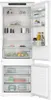 An open refrigerator with food and containers inside. Anteprima dell’immagine prodotto