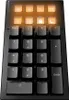 A close-up view of a black numeric keypad with illuminated orange function keys at the top. Produktbild-Vorschau