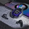 A pair of wireless earbuds and their charging case are placed on a textured surface next to a smartphone displaying music. Anteprima dell’immagine prodotto