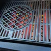 A close-up view of a grill grate with heat reflectors glowing red underneath. Produktbild-Vorschau