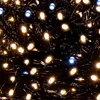 A close-up view of many small, glowing LED lights strung together. Produktbild-Vorschau
