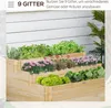 A tiered wooden planter box filled with various plants and flowers, set against a white wooden wall. Produktbild-Vorschau
