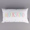 Magma Deko Kissen mit Aufschrift Glückskind weiß pastell Produktbild-Vorschau 1