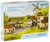 A box of a wooden hobby kit depicting a village scene with houses, a watermill, and a windmill. Produktbild-Vorschau