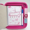 A pink electronic diary for children with a notebook and pen. Anteprima dell’immagine prodotto