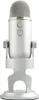 A silver microphone on a stand against a white background. Produktbild-Vorschau