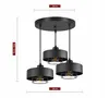 A black pendant light fixture with three lamps is shown against a white background, with dimensions indicated by measurement lines and text. Podgląd zdjęcia produktu