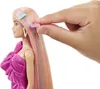 A close-up shot of a Barbie doll's head and shoulders, with a hand placing a small pink hair clip with the word 'LOVE' on it into the doll's long, multi-colored hair. Another blue hair clip is already in the doll's hair. Anteprima dell’immagine prodotto