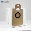 A white vacuum cleaner dust bag with a brown cardboard attachment and a black ring. Voir les images du produit