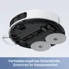 The underside of a white robot vacuum cleaner is shown, highlighting its brushes and mopping pads, with text overlay describing a feature. Produktbild-Vorschau