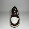 A studio shot of a single Nike Dunk Low Cacao Wow sneaker against a plain background. Náhled obrázku produktu