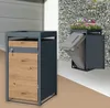 Two modern trash can enclosures are shown outdoors, one with a planter on top and a bin being emptied. Produktbild-Vorschau