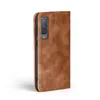A brown flip cover phone case is shown against a white background. Produktbild-Vorschau