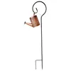 A decorative watering can attached to a garden stake. Anteprima dell’immagine prodotto
