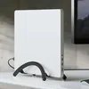 A white laptop stand is shown on a desk, holding a white laptop vertically. A computer monitor is visible to the right. Produktbild-Vorschau