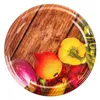 A circular image featuring a variety of fresh vegetables and fruits arranged on a wooden background. Voir les images du produit