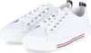 A pair of white sneakers with red and blue accents. Produktbild-Vorschau