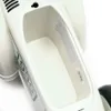 A close-up, overhead view of the interior of a white baby bouncer. Produktbild-Vorschau