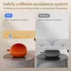 A split image comparing a desk with an anti-collision function to one without, using abstract representations of objects. Voir les images du produit
