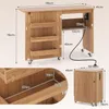 A wooden sewing table with shelves and a charging station, shown with dimensions. Produktbild-Vorschau