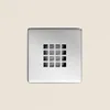 A close-up, centered shot of a square shower drain with a grid pattern. Produktbild-Vorschau