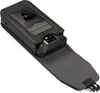 A black leather holster for a phone, with the phone partially visible inside. Náhled obrázku produktu