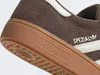 A close-up view of the side and sole of an Adidas Handball Spezial shoe. Voir les images du produit
